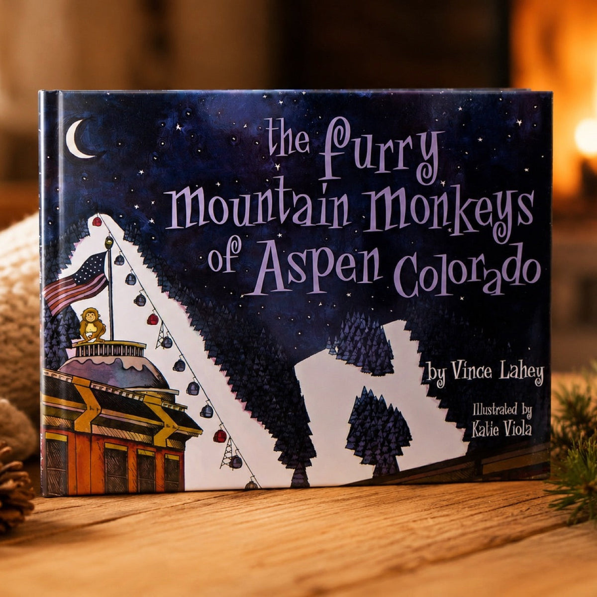 Hardcover edition of The Furry Mountain Monkeys of Aspen, Colorado standing on a wooden table.